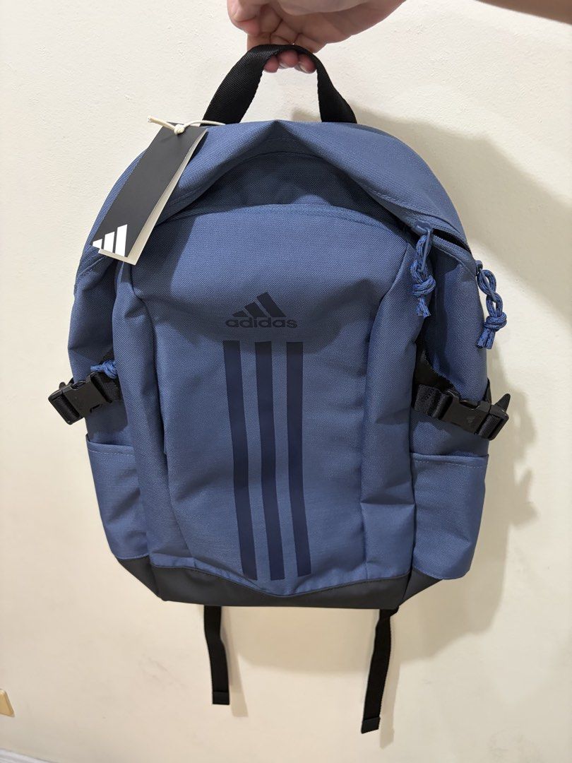Adidas Power VII Backpack (Category: Backpacks) located in Las Pinas. Submitted by bellagirl28 (Listing ID 1438919635, Image 2). Description: Adidas Power VII backpack is a stylish and functional choice. Its a practical backpack with laptop compartment. It features the iconic Adidas logo and three stripes design. The backpack has a main compartment and side pockets. The tag shows the original price of PHP 2,000. The backpack is in a blue color. D