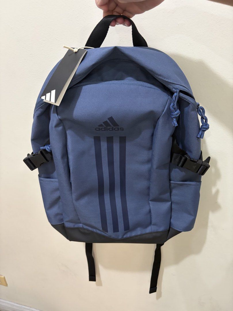 Adidas Power VII Backpack (Category: Backpacks) located in Las Pinas. Submitted by bellagirl28 (Listing ID 1438919635, Image 3). Description: Adidas Power VII backpack is a stylish and functional choice. Its a practical backpack with laptop compartment. It features the iconic Adidas logo and three stripes design. The backpack has a main compartment and side pockets. The tag shows the original price of PHP 2,000. The backpack is in a blue color. D