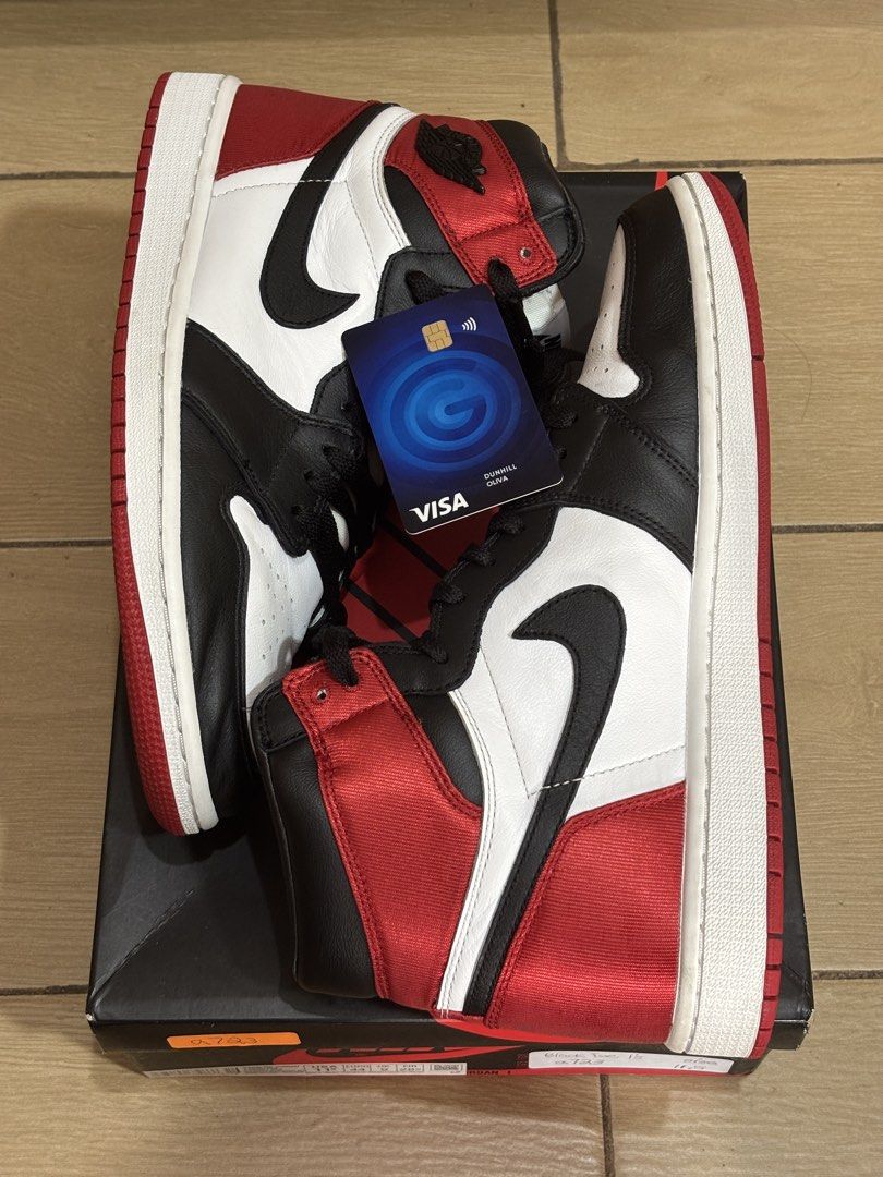 Air Jordan 1 High OG Satin Red (Category: Sneakers) located in Taguig. Submitted by bazingaaa (Listing ID 1439012786, Image 1). Description: For sale only Air Jordan 1 High Satin Black Toe Bought from eBay Size 11.5W / 10 Mens Barely used, no issues 5000 php only negotiable MOP: BPI, Gcash, LBC Cash On Pickup Meetup Venice Grand Canal Mall Taguig or Glorietta Makati (Tuesday/Wednesday) or shipping via LBC or Grab (buyer shoulders fees).