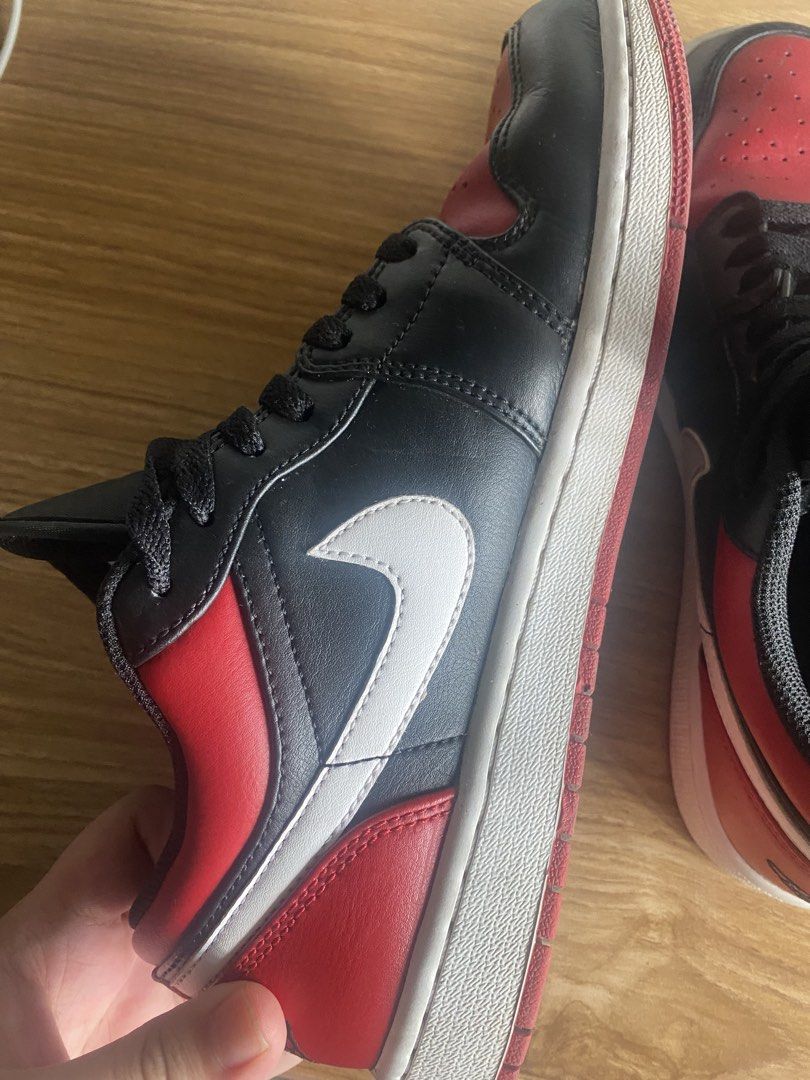 Air Jordan 1 Low Black Red (Category: Sneakers) located in Manila. Submitted by tonymagban96143 (Listing ID 1438955998, Image 1). Description: - Air Jordan 1 Low - Colorway: Black and Red - Size: US 8 - White Nike swoosh - Black laces - Red Jumpman logo on tongue - White soles with red accents .