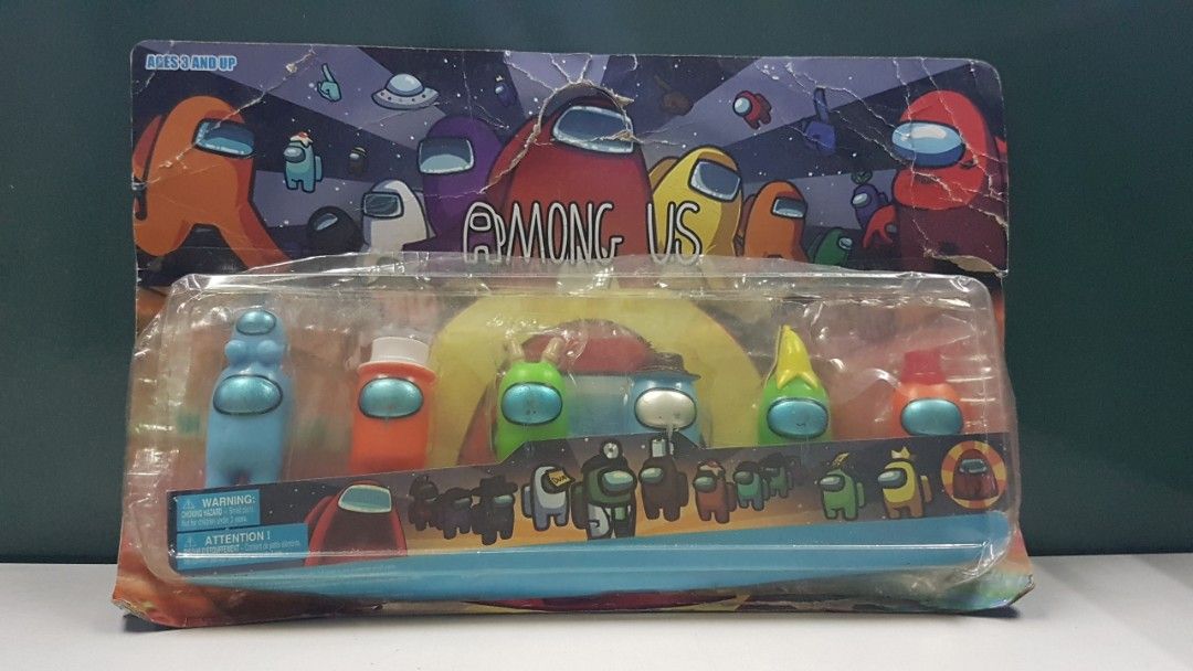 Among Us Action Figures (Category: Figurines & Statues) located in Quezon City. Submitted by whizdepot (Listing ID 1438943898, Image 1). Description: These appear to be unofficial or "bootleg" Among Us collectible figures..