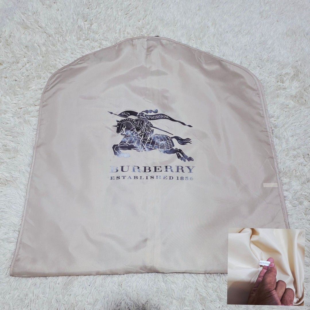 Authentic Burberry Garment Bag (Category: Luxury Bags & Wallets) located in Binangonan. Submitted by makoleksyon (Listing ID 1438929010, Image 1). Description: excellent condition like new no flaws water proof and dust proof material bought in Japan 100% Authentic Money back guarantee.