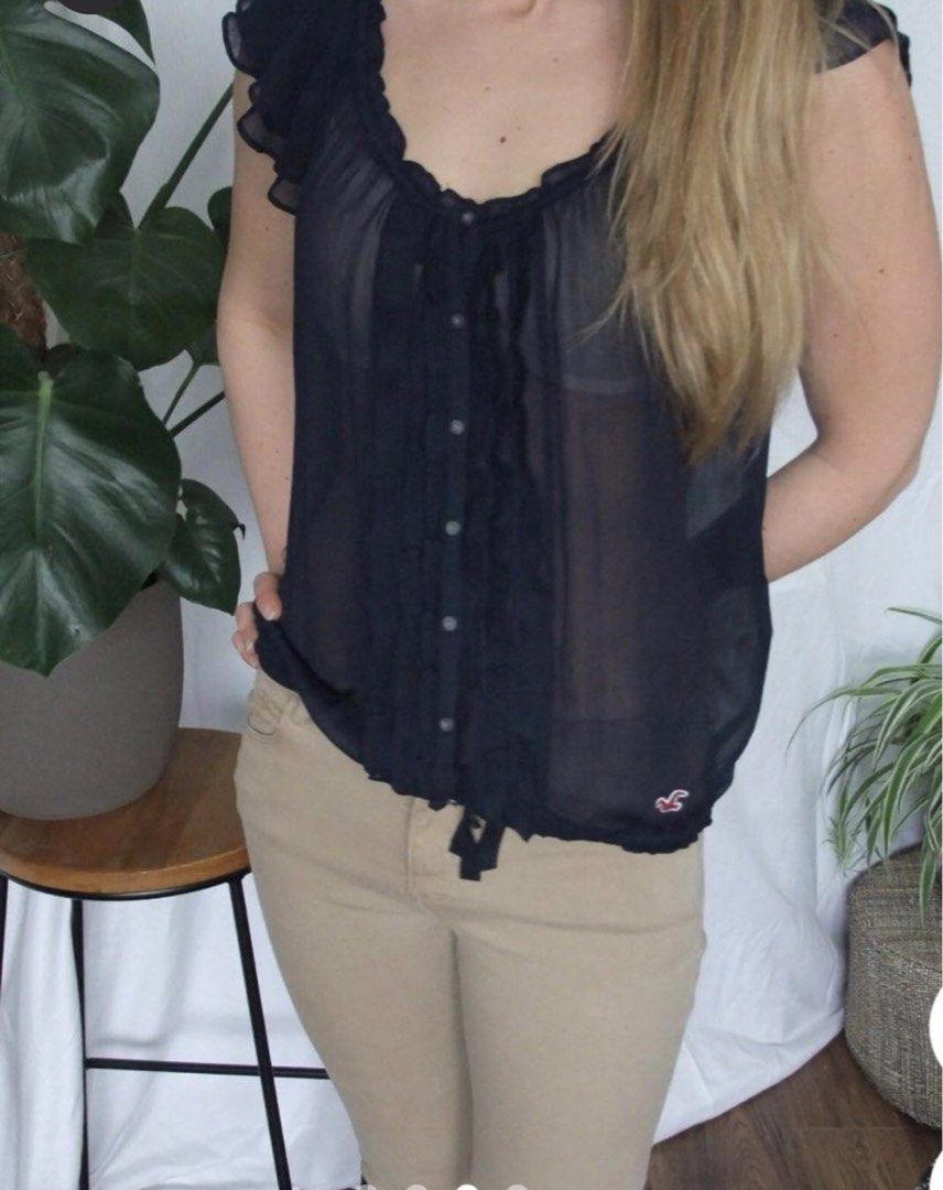 Authentic Hollister Ruffle Trim Top Mediium (Category: Blouses) located in Calapan. Submitted by shakalak2 (Listing ID 1439021270, Image 2). Description: Authentic cut tag ( makati) Guaranteed authentic Was 499.