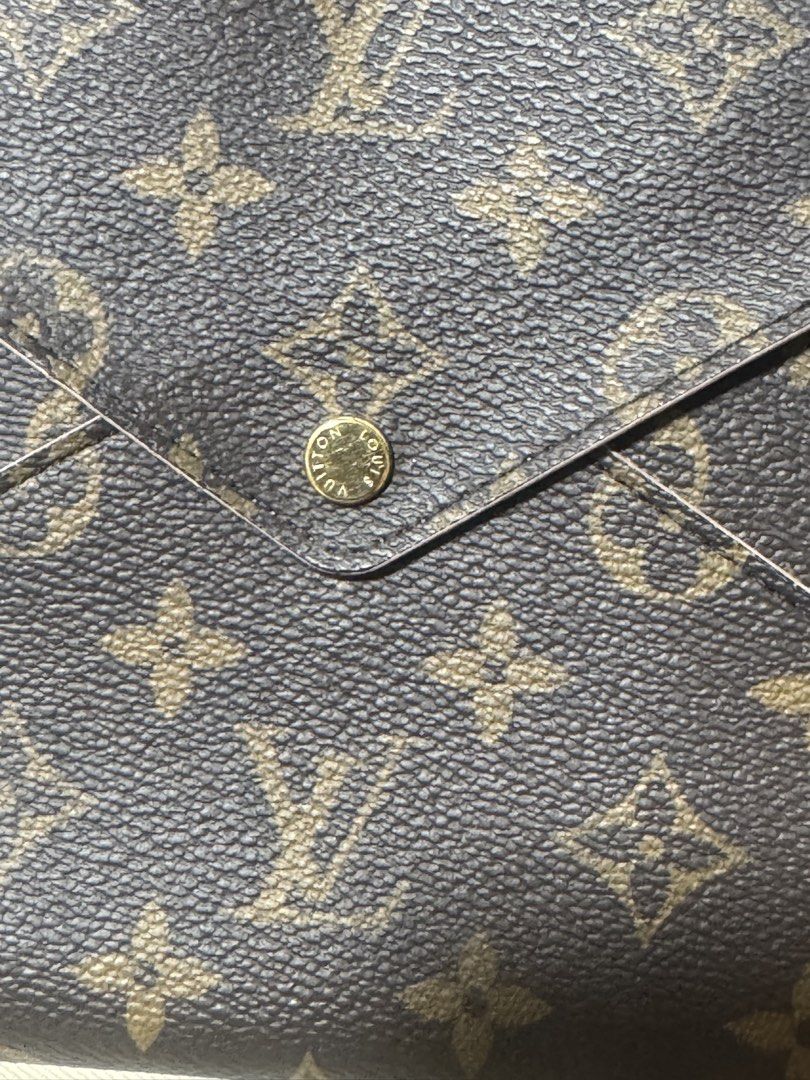 Authentic Louis Vuitton Kirigami Pochette Large (Category: Luxury Bags & Wallets) located in Manila. Submitted by calipotski (Listing ID 1438991028, Image 3). Description: For Sale Louis Vuitton Kirigami Pochette Large 💯 Original Microchip With box, card and dustbag Good as new With initial J Interested just pm me.