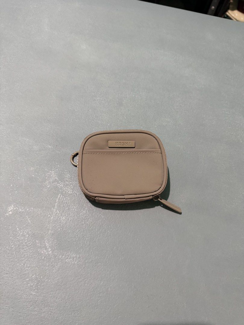 Bagsin Small Wallet (Category: Wallets & Card holders) located in Pasig City. Submitted by rodincorpuz3 (Listing ID 1439061858, Image 1). Description: - Compact zip wallet - Multiple compartments for cards and cash - Features a small loop for keychain attachment - Solid, neutral exterior color - Matching interior lining.