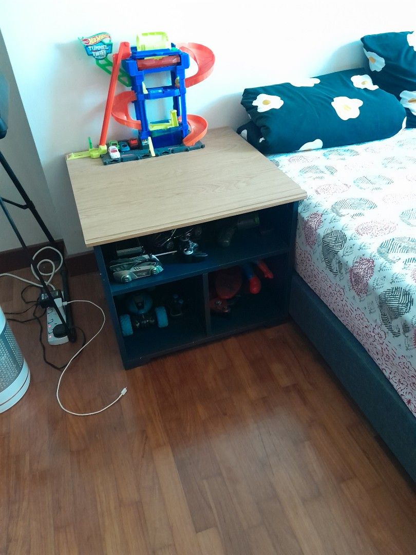 Bed side table (Category: Tables & Sets) located in Singapore. Submitted by aadrita (Listing ID 1438930621, Image 1). Description: - Fun kids' toy - Features a blue and red design - Perfect for playtime - Fully functional and ready for adventures.
