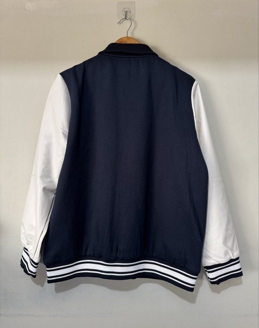 Bench Varsity Jacket Navy Blue White (Category: Coats, Jackets and Outerwear) located in Pasig City. Submitted by _king.declutter (Listing ID 1439020011, Image 3). Description: FOR SALE ONLY NO SWAP OR TRADE🚩 PERSONAL ITEMS NOT THRIFTED OR UKAY🚩 DECLUTTER SALE ONLY🚩 BRAND NEW BENCH VARSITY JACKET NAVY BLUE / WHITE LARGE BRAND NEW 1699 ONLY 1899 ORIGINAL PRICE PICK UP MEET UP ORTIGAS PASIG ONLY DELIVERY VIA LALAMOVE GRAB LBC J&T.
