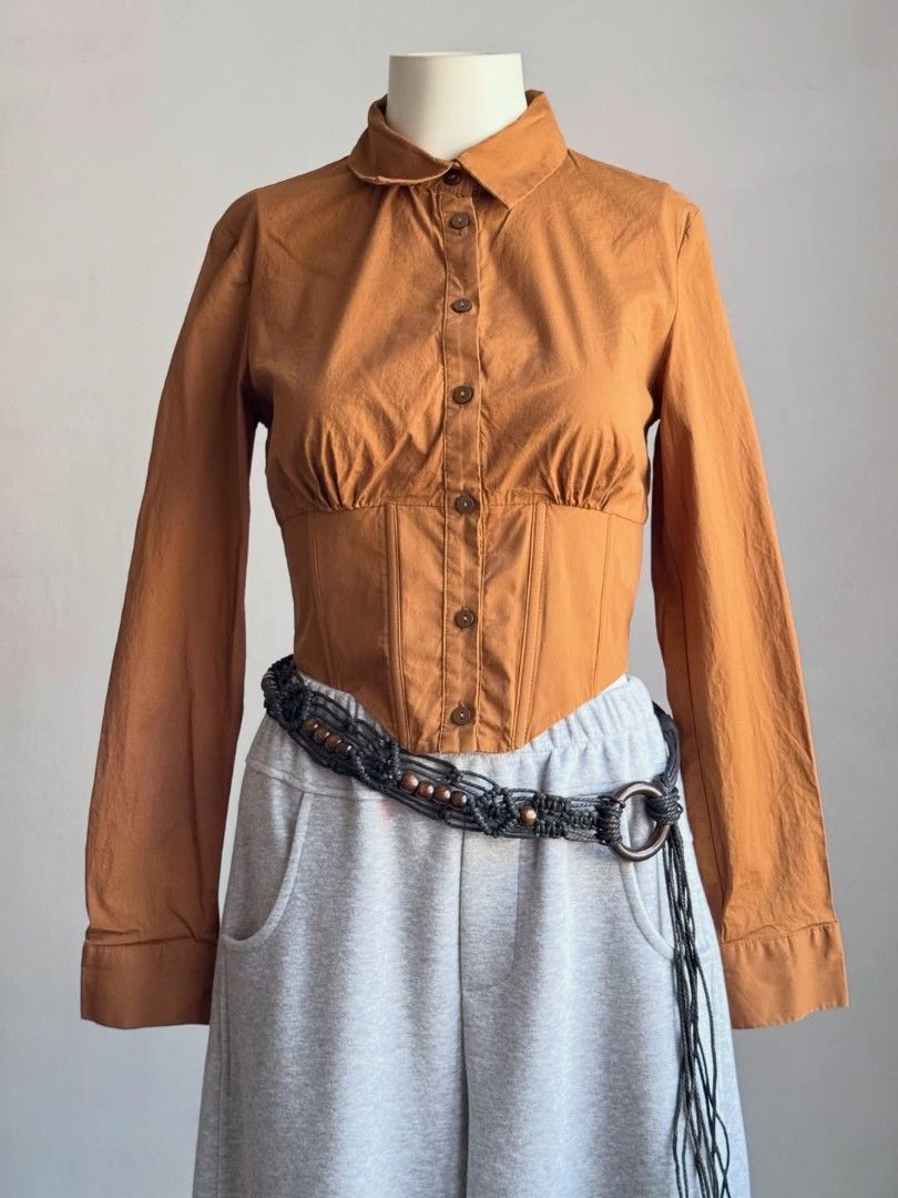 bershka brown boned fitted btd top (Category: Longsleeves) located in Legazpi City. Submitted by z.ehranicole (Listing ID 1439010231, Image 1). Description: small to medium.