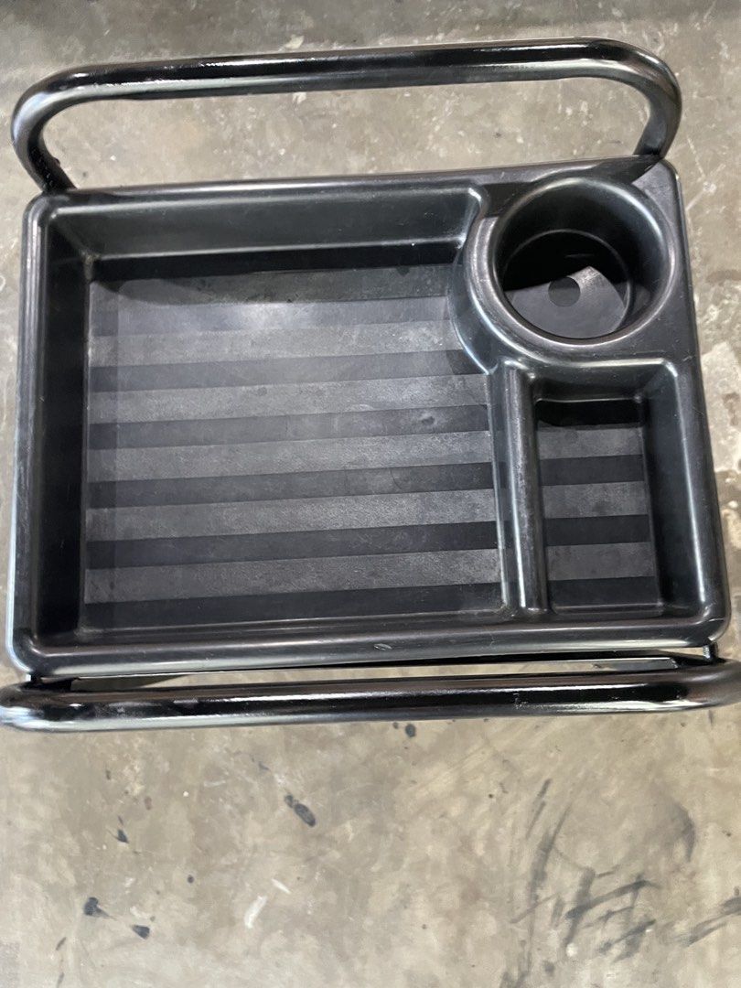Black Salon Cart with Trays (Category: Office Furniture & Fixtures) located in Santa Rosa. Submitted by emelyn71 (Listing ID 1438925579, Image 2). Description: - Black salon cart - Multiple trays for storage and organization - Sturdy metal frame with mesh design - Includes tray with cup holder and compartments - Designed with wheels for easy mobility - Ideal for salons or organized storage needs.