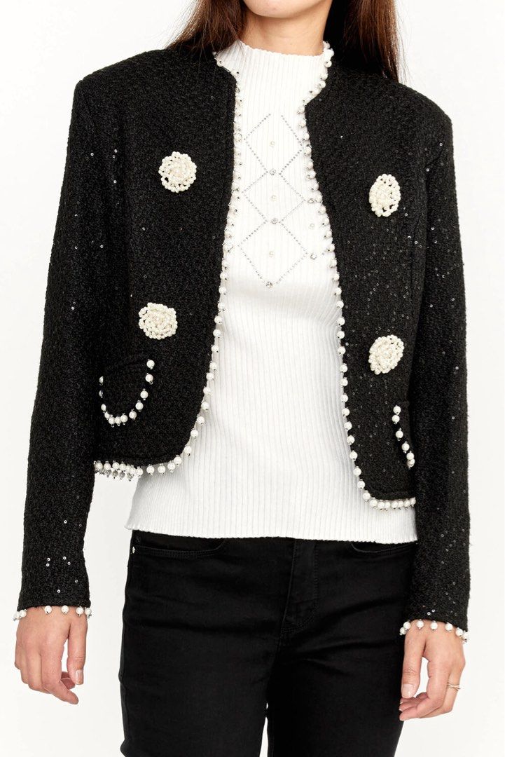 Black Tweed Jacket with Pearl Embellishments (Category: Coats, Jackets and Outerwear) located in Manila. Submitted by decluterthings888 (Listing ID 1439057095, Image 1). Description: - Black tweed jacket - Pearl embellishments - Round neckline - Decorative pearl buttons - Pearls on edges and cuffs - Stylish design - Suitable for various occasions.
