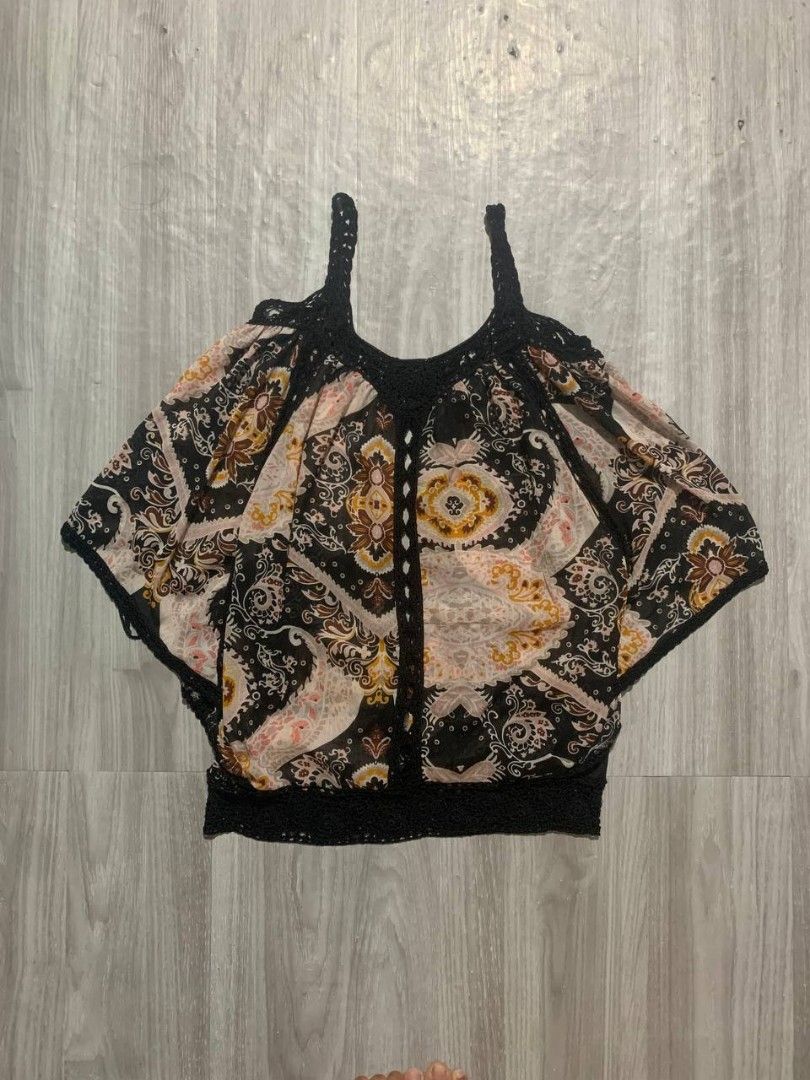 Boho Paisley Print Off-Shoulder Top (Category: Blouses) located in Las Pinas. Submitted by blitzycloth (Listing ID 1438995999, Image 1). Description: Boho off-shoulder top with paisley print. Features crochet neckline and detailing. Relaxed fit, perfect for casual wear..