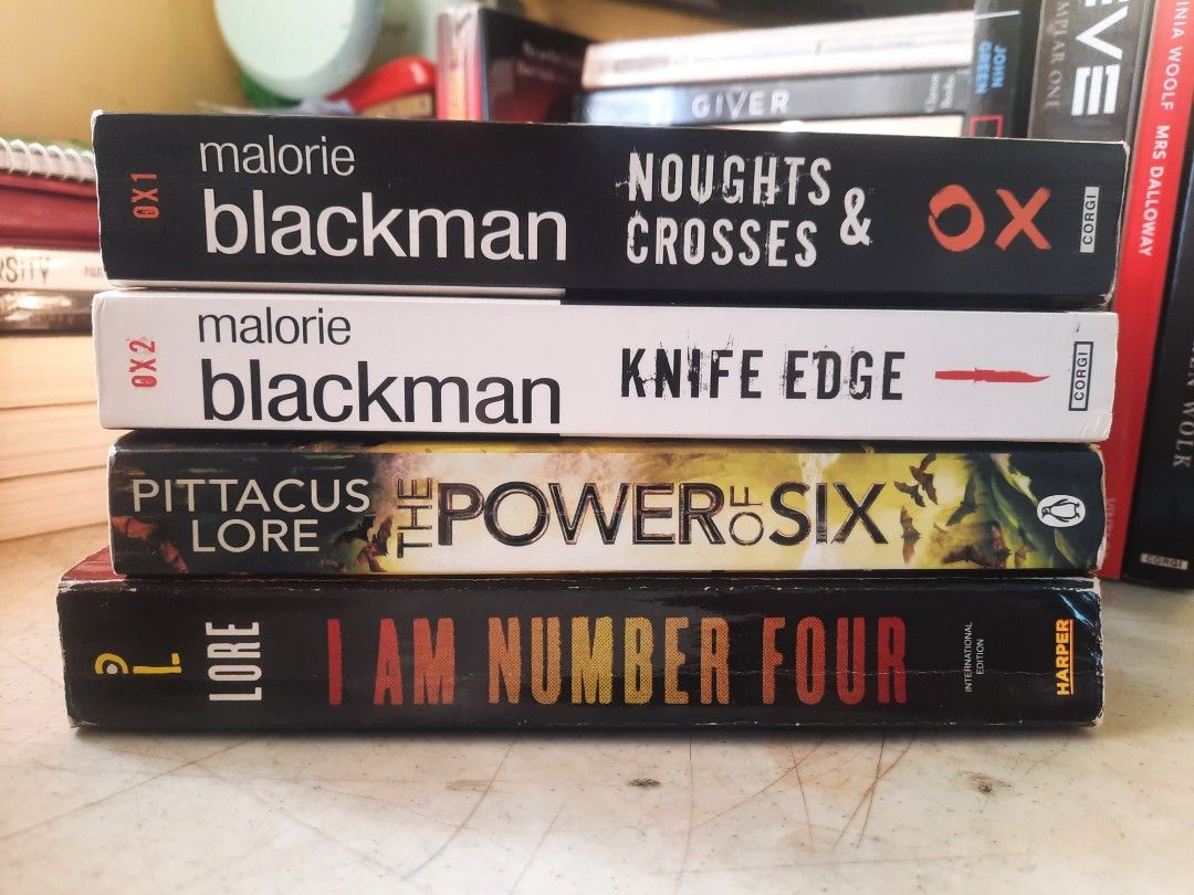 Books bundle (Category: Storybooks) located in Baguio. Submitted by el_sakands (Listing ID 1438880846, Image 1). Description: Take all 250.00 only Lorien Legacies 1 and 2 - 150.00 Noughts and Crosses 1 and 2 - 150.00 MOP: GCash, Maya, GoTyme.