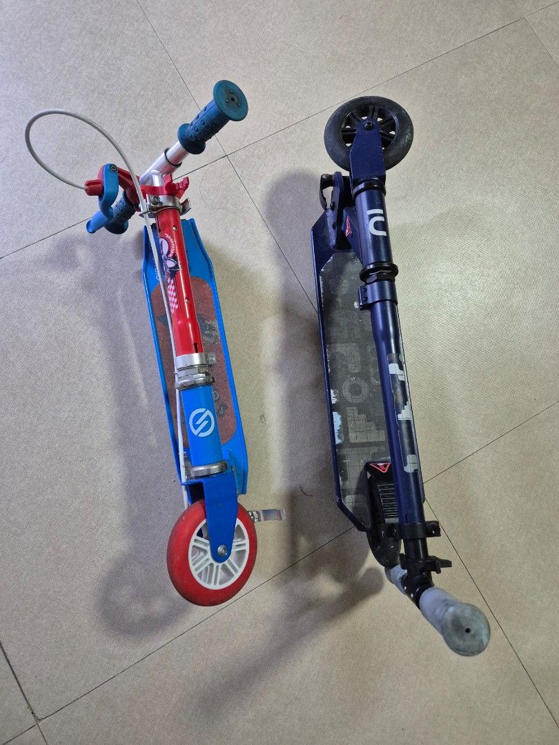Boys Scooter (Category: Skates, Rollerblades & Scooters) located in Manila. Submitted by bajoyskie (Listing ID 1439031932, Image 1). Description: - Micro scooter, foldable design - Blue handlebars with blue and red accents - Wooden deck - Red and white wheels - In good working condition 1k each.