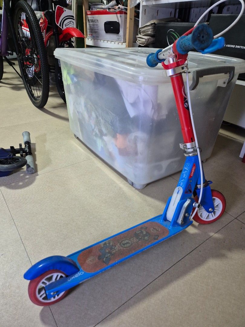 Boys Scooter (Category: Skates, Rollerblades & Scooters) located in Manila. Submitted by bajoyskie (Listing ID 1439031932, Image 2). Description: - Micro scooter, foldable design - Blue handlebars with blue and red accents - Wooden deck - Red and white wheels - In good working condition 1k each.