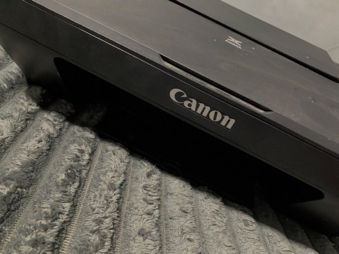 Canon PIXMA MG2545S Printer (Category: Printers, Scanners & Copiers) located in Cavite. Submitted by glockeyes (Listing ID 1439022315, Image 1). Description: - Canon PIXMA MG2545S printer - In good working condition - Features a scanner - Includes a paper tray - Model number visible - Sleek black design .