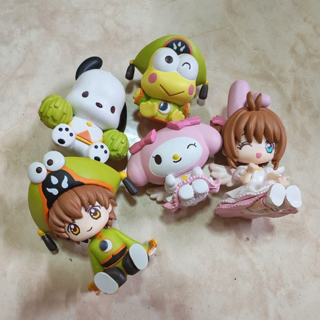 Card Captor Sakura Sanrio Figure Set (Category: Designer & Blind Box Toys) located in Caloocan City. Submitted by yaoizzy (Listing ID 1438895720, Image 1). Description: - Sanrio & Cardcaptor Sakura Figurine Set - Features Pochacco, Keroppi, My Melody, and Sakura - Colorful and detailed designs - Perfect for collectors and fans - Ideal for display or gifting.