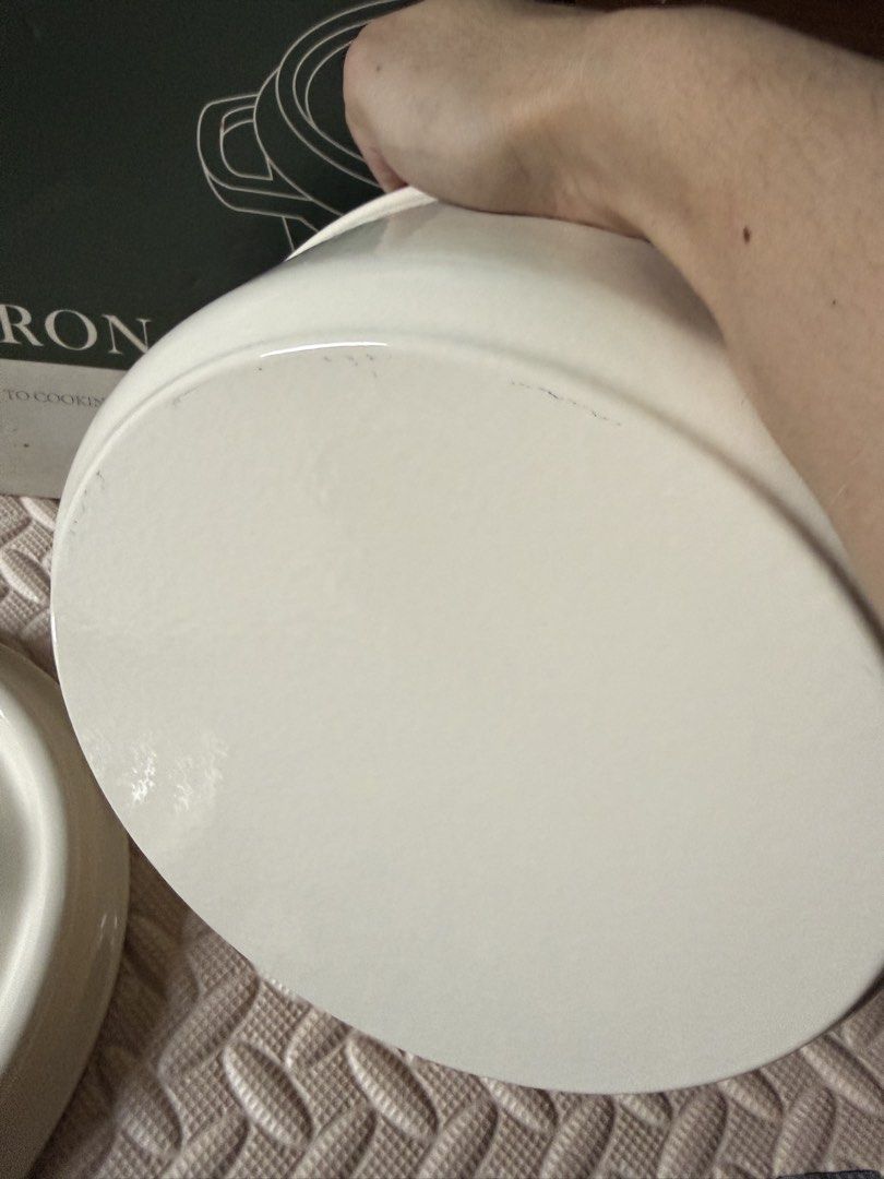 Carote 24cm Enamel Cast Iron Pot (Category: Cookware & Accessories) located in Quezon City. Submitted by eckaaatxn (Listing ID 1438960125, Image 3). Description: - Carote 24cm Enamel Cast Iron Pot - Cream exterior, black interior - Includes matching lid - Designed by Carote - Suitable for cooking and serving.