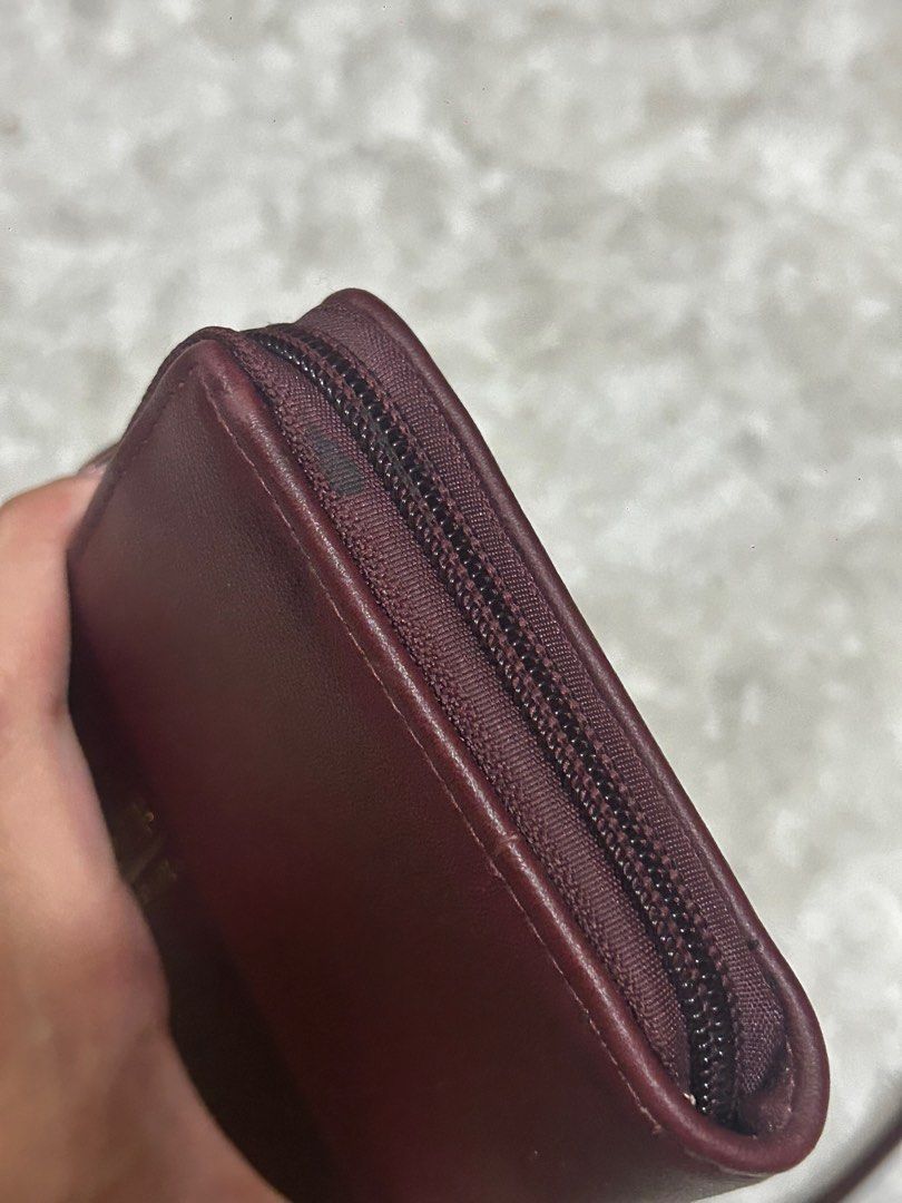 Carven Paris Wristlet Wallet (Category: Wallets & Card holders) located in Las Pinas. Submitted by ameothings (Listing ID 1439037806, Image 3). Description: please manage your expectations, this item has flaws as seen on pic. the issue of the leather itself— barely noticeable. the wristlet chain could be removed and change it as a wallet color: maroon dm if interested!.