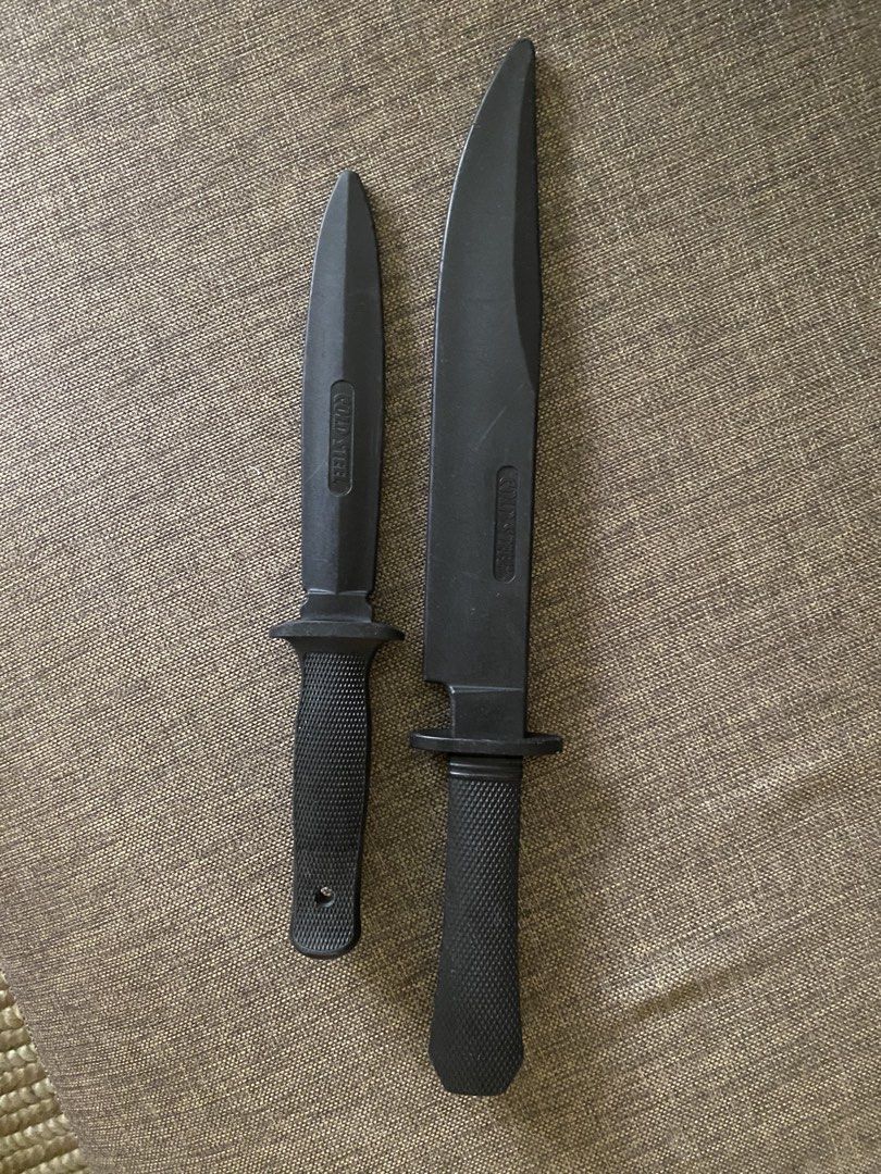 Cold Steel Training Knife Set (Category: Other Sports Equipment and Supplies) located in Mandaluyong City. Submitted by declutteringmodenow (Listing ID 1438936904, Image 1). Description: - Set of two Cold Steel training knives - Includes a small dagger and a larger blade - Both knives are black - Textured handles for a secure grip - Cold Steel logo visible - Made of durable material - Perfect for training.