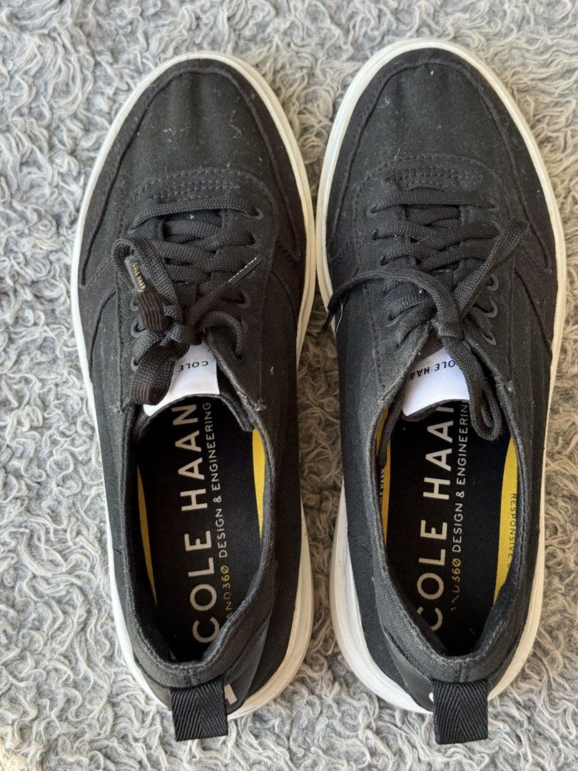 Cole Haan Men's Canvas Sneakers (Category: Sneakers) located in Pasig City. Submitted by caren1989 (Listing ID 1438953590, Image 3). Description: - Cole Haan men's sneakers - Black canvas upper - White sole and black laces - Size: 8.5W - Features Cole Haan logo - Insole print: "COLE HAAN 360 DESIGN & ENGINEERING.