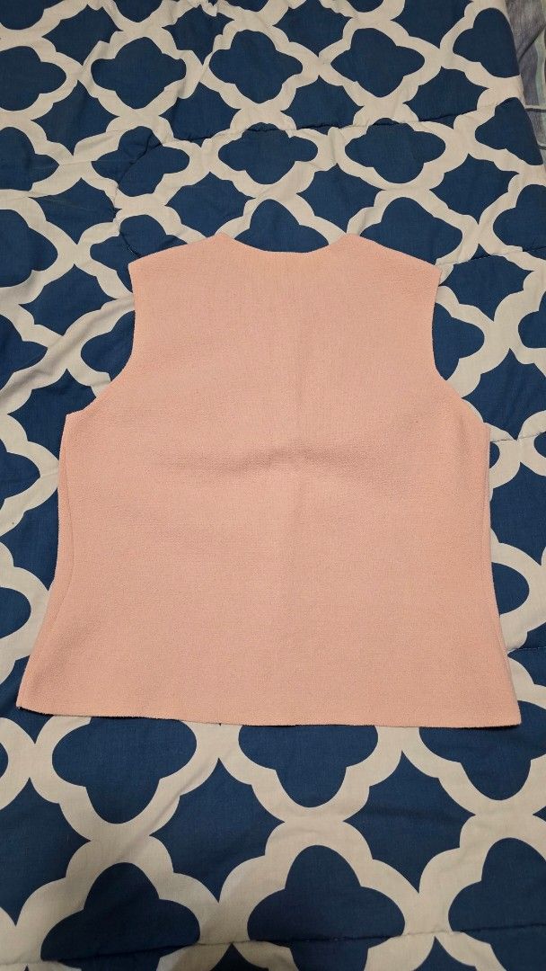 COS Knitted Cotton Waistcoat (Category: Blouses) located in Las Pinas. Submitted by insouciant_worrier (Listing ID 1439051184, Image 2). Description: - COS Sleeveless Top - Light Pink Color - Size: M - Fabric: Cotton, Polyamide, Elastane Used once RFS: wrong size.