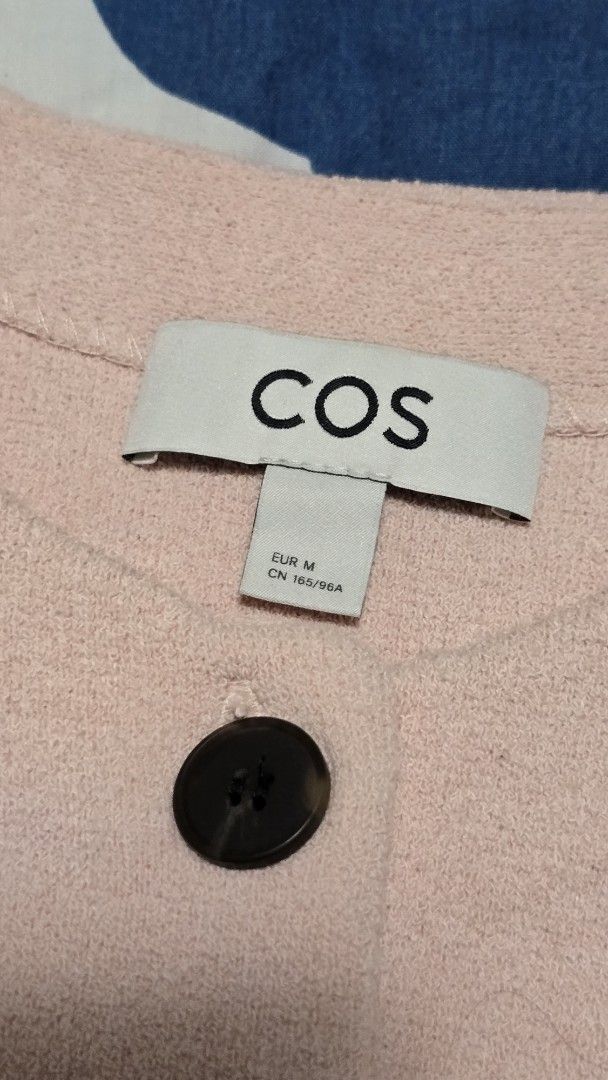 COS Knitted Cotton Waistcoat (Category: Blouses) located in Las Pinas. Submitted by insouciant_worrier (Listing ID 1439051184, Image 3). Description: - COS Sleeveless Top - Light Pink Color - Size: M - Fabric: Cotton, Polyamide, Elastane Used once RFS: wrong size.