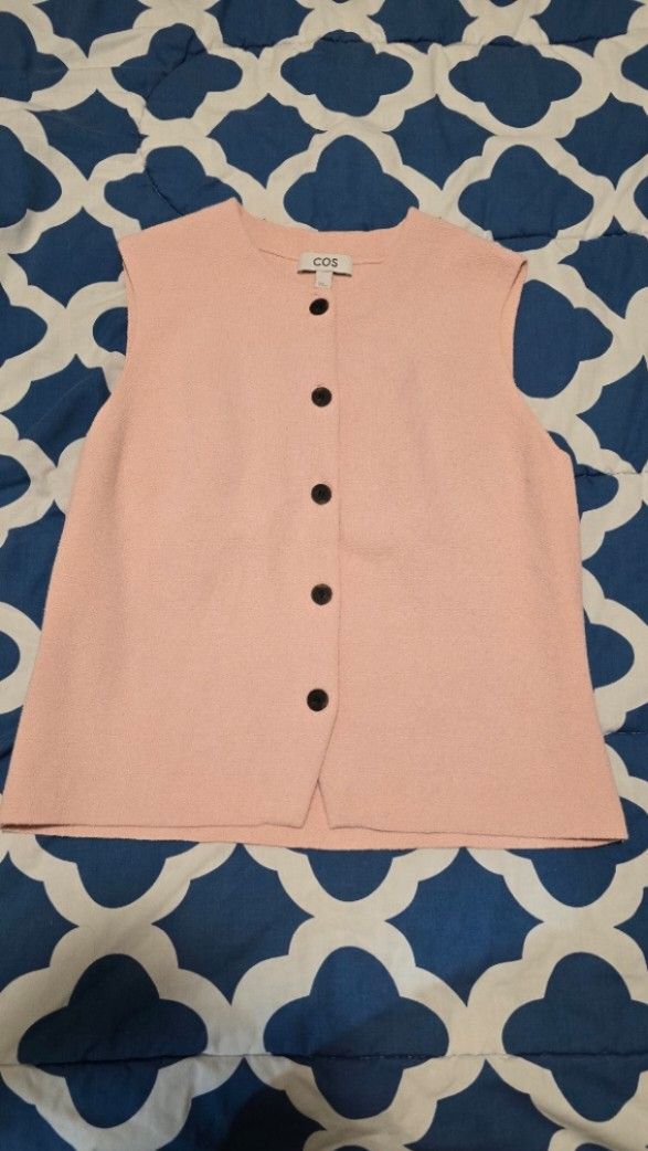 COS Knitted Cotton Waistcoat (Category: Blouses) located in Las Pinas. Submitted by insouciant_worrier (Listing ID 1439051184, Image 1). Description: - COS Sleeveless Top - Light Pink Color - Size: M - Fabric: Cotton, Polyamide, Elastane Used once RFS: wrong size.