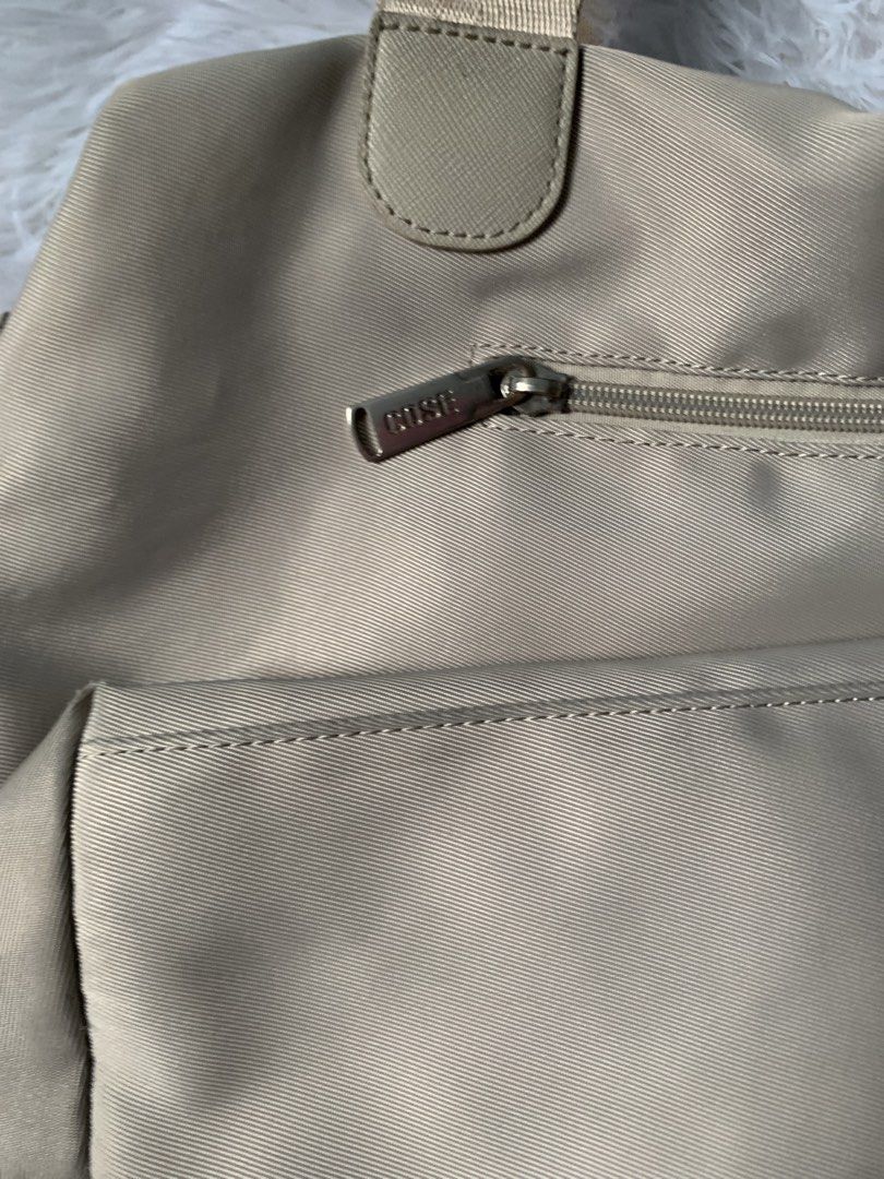 Cose Shoulder Bag - School and Office Bag (Category: Shoulder Bags) located in Manila. Submitted by bymarjjj.r (Listing ID 1438939343, Image 3). Description: bought for 1k used for almost a year lang color: champagne/pale washed already minimal issue: check last slide rfs: decluttering bags .
