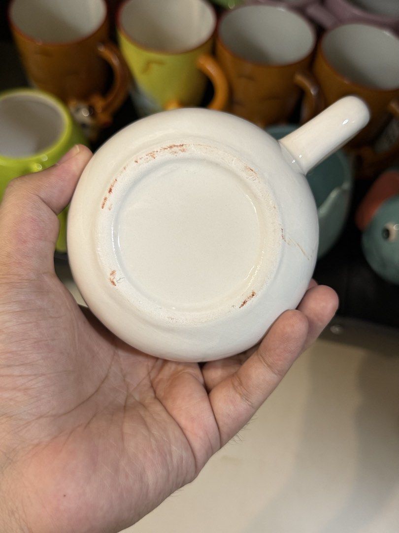 Cute Cat Coffee Mug (Category: Coffee & Tea Tableware) located in Pasig City. Submitted by moldednobu (Listing ID 1439066310, Image 3). Description: Mall pull-out With 3D design. 1 stock available No issues. Can do orange app checkout. Please follow our social media pages @moldednobu and get a 10% discount. We are new to ceramic business, hence your support is much appreciated. .