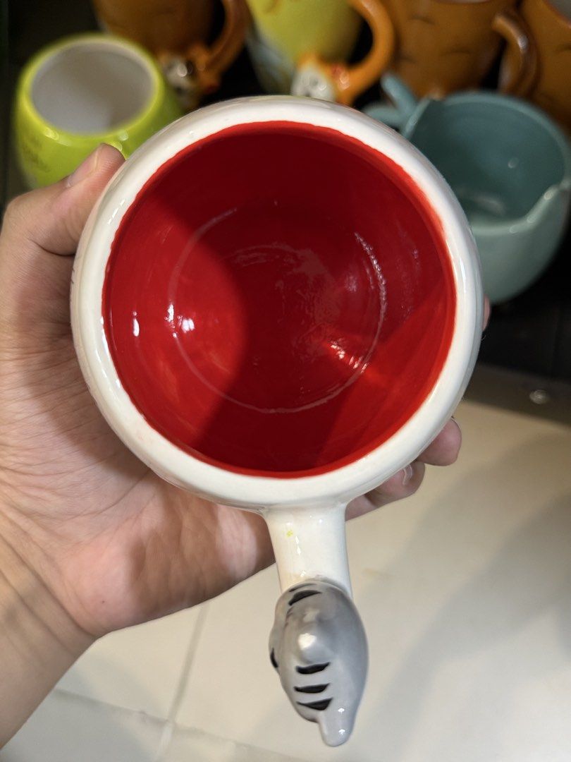 Cute Cat Coffee Mug (Category: Coffee & Tea Tableware) located in Pasig City. Submitted by moldednobu (Listing ID 1439066310, Image 2). Description: Mall pull-out With 3D design. 1 stock available No issues. Can do orange app checkout. Please follow our social media pages @moldednobu and get a 10% discount. We are new to ceramic business, hence your support is much appreciated. .