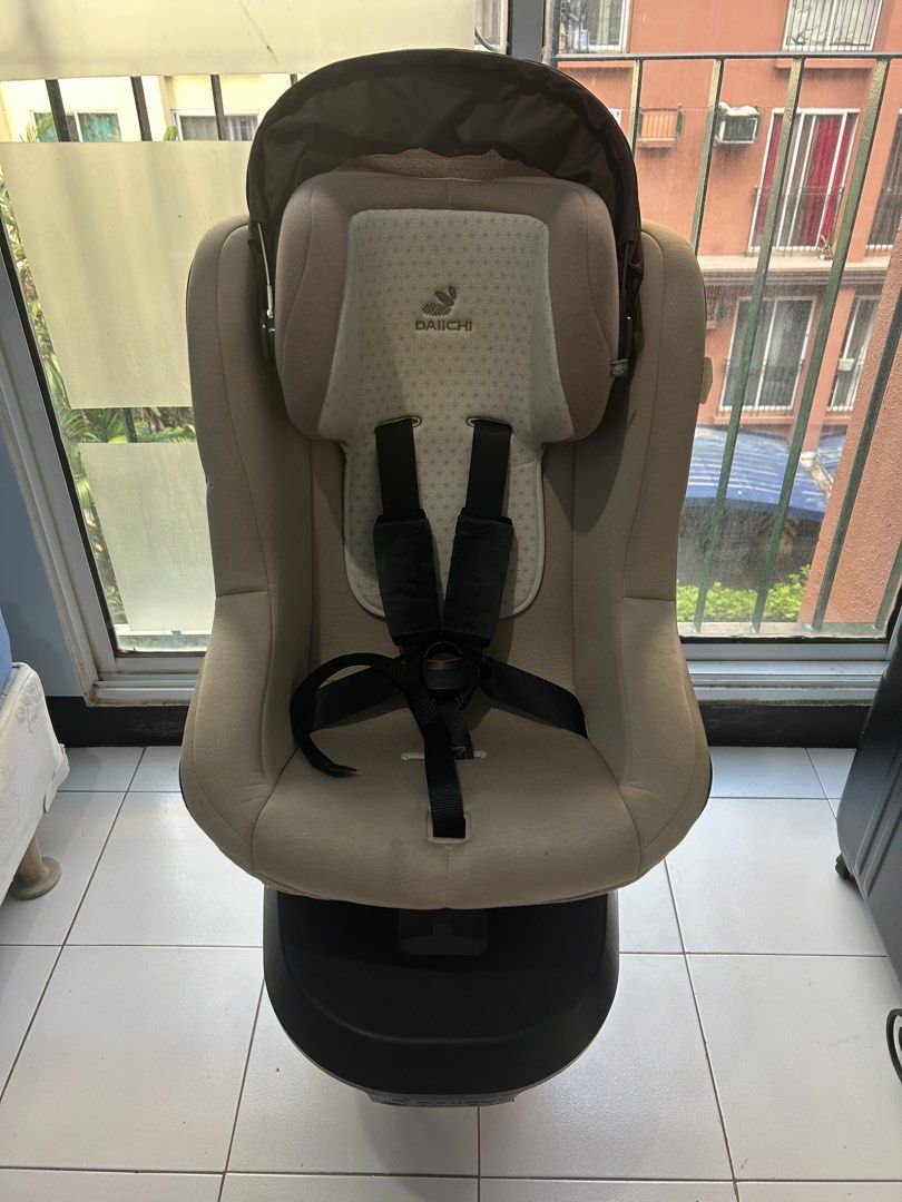 Daichi Car Seat (Category: Car Seats) located in Paranaque City. Submitted by skystoremer (Listing ID 1438989155, Image 1). Description: - Daichi car seat - Rotating base for easy access - Color: Beige and black - Includes sunshade - Five-point harness for safety - Designed for comfort and protection - Suitable for various car models - ISO FIX car seat.