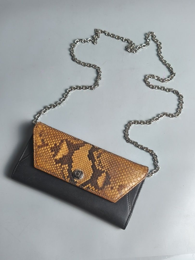 Dior Python Wallet on Chain (Category: Luxury Bags & Wallets) located in Bulacan. Submitted by 4kcollection (Listing ID 1438946279, Image 3). Description: Dior Python Wallet on Chain Pre-loved from Japan 🇯🇵 Excellent Condition Real Python Skin💯 Made in Spain Minimal sign of Use No Issue Dm for sure buyer 📩 MOP: Gcash / Maya / BPI Courier: J&t / Lbc / Lalamove Location: SJDM Bulacan.