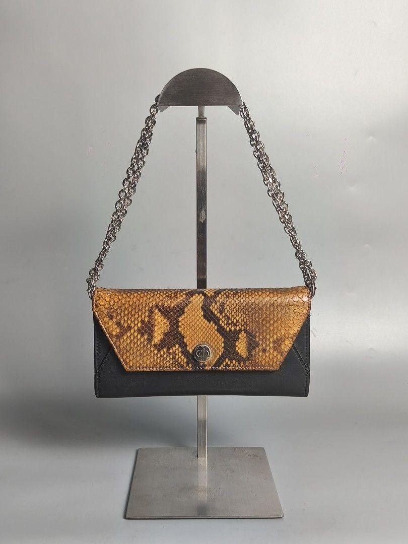 Dior Python Wallet on Chain (Category: Luxury Bags & Wallets) located in Bulacan. Submitted by 4kcollection (Listing ID 1438946279, Image 1). Description: Dior Python Wallet on Chain Pre-loved from Japan 🇯🇵 Excellent Condition Real Python Skin💯 Made in Spain Minimal sign of Use No Issue Dm for sure buyer 📩 MOP: Gcash / Maya / BPI Courier: J&t / Lbc / Lalamove Location: SJDM Bulacan.