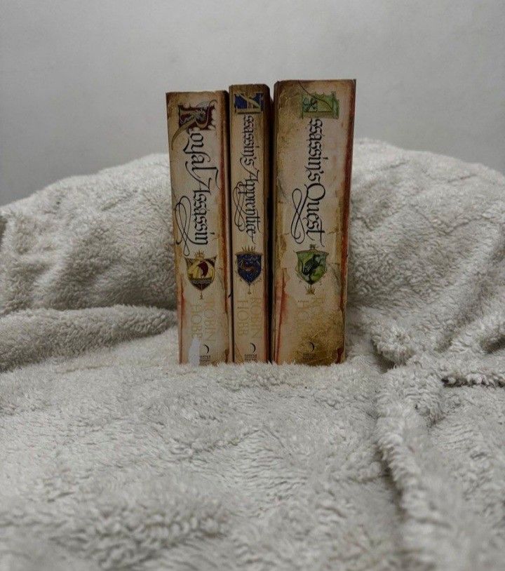Farseer Trilogy by Robin Hobb (Category: Storybooks) located in Imus. Submitted by shelves_of_aaron (Listing ID 1439058568, Image 2). Description: Assassins Apprentice Royal Assassin Assassins Quest SOLD AS SET Has minimal shipping damage Shipping: J&T/Lalamove Mode of Payment: GCASH.