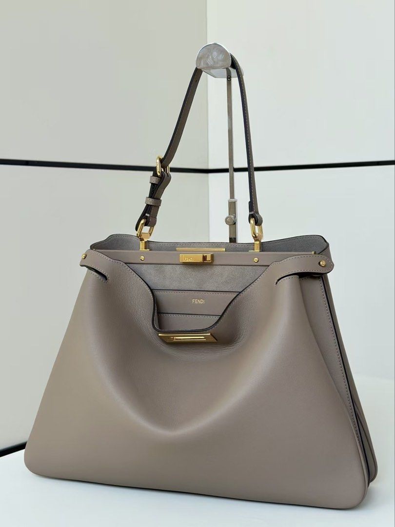 Fendi peekaboo in medium size taupe (Category: Luxury Bags & Wallets) located in Manila. Submitted by pursonalshopper (Listing ID 1439012470, Image 1). Description: Complete inclusions with box dustbag tags, Dustbag , tags cards and paperbag .