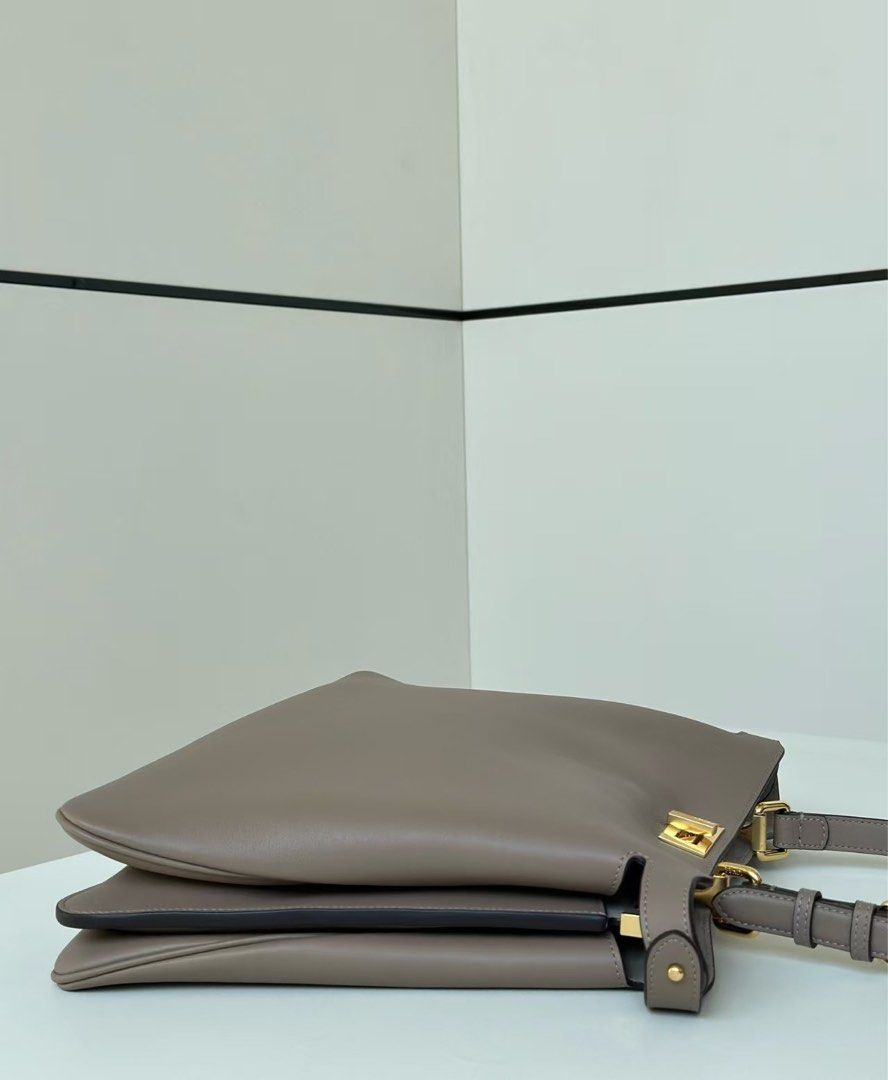 Fendi peekaboo in medium size taupe (Category: Luxury Bags & Wallets) located in Manila. Submitted by pursonalshopper (Listing ID 1439012470, Image 2). Description: Complete inclusions with box dustbag tags, Dustbag , tags cards and paperbag .