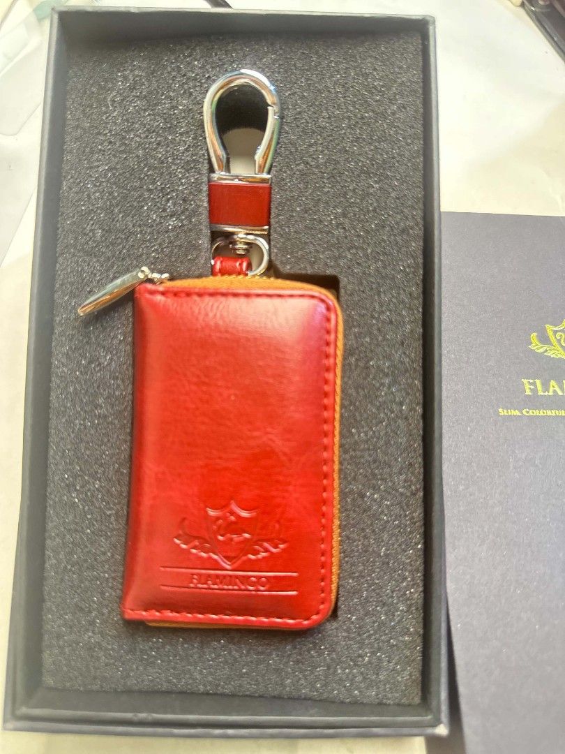 Flamingo Smart Key Case - Red (Category: Luxury Bags & Wallets) located in Pulilan. Submitted by cbssurplus (Listing ID 1439049683, Image 2). Description: - Flamingo smart key case / coin purse larger bag charm - Color: Red - Zipper closure - Includes key ring - Embossed Flamingo logo - Comes with original box WE SHIP NATIONWIDE VIA J&T SF MUST BE PAID BY BUYER.