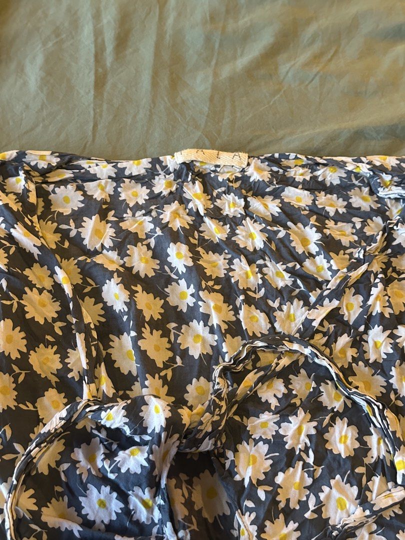 Floral Print Mini Dress (Category: Dresses) located in Taguig. Submitted by adelledeclutters (Listing ID 1439020097, Image 2). Description: - Floral print dress - Cinched waist - Lightweight fabric - V-neckline - Flowing skirt - Ideal for warm weather.