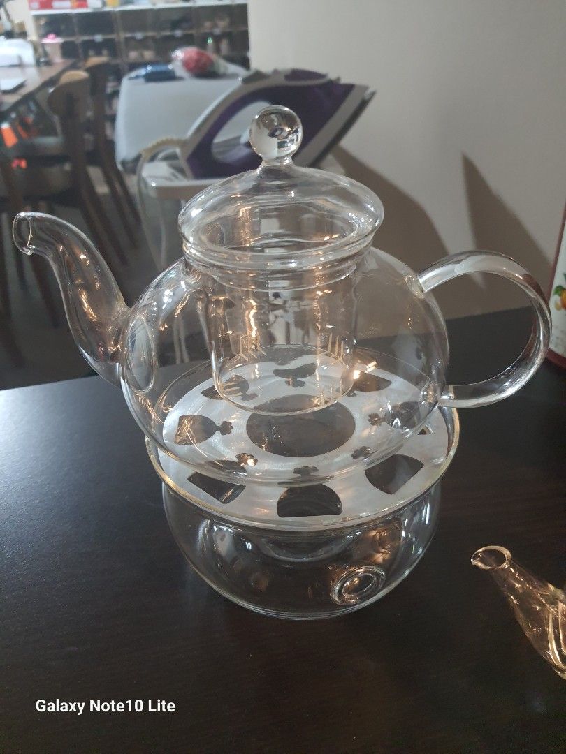 Glass teapot and cup459802900474122240