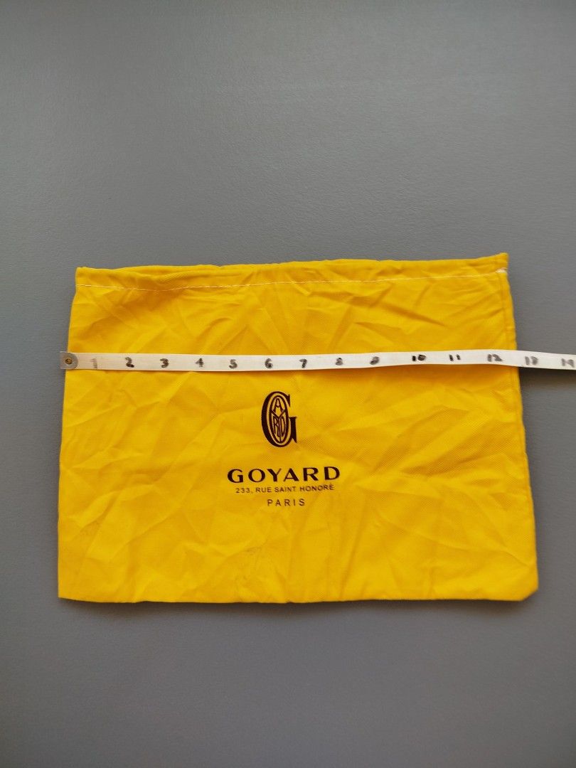 Goyard Dust Bag (Category: Luxury Bags & Wallets) located in Calamba. Submitted by merrymerida (Listing ID 1438914466, Image 1). Description: - Authentic Goyard dust bag - Color: Yellow - Shape: Rectangular - Features the Goyard logo - Condition: Shows some stains - Dimensions: Approximately 14 inches (height) x 9 inches (width).