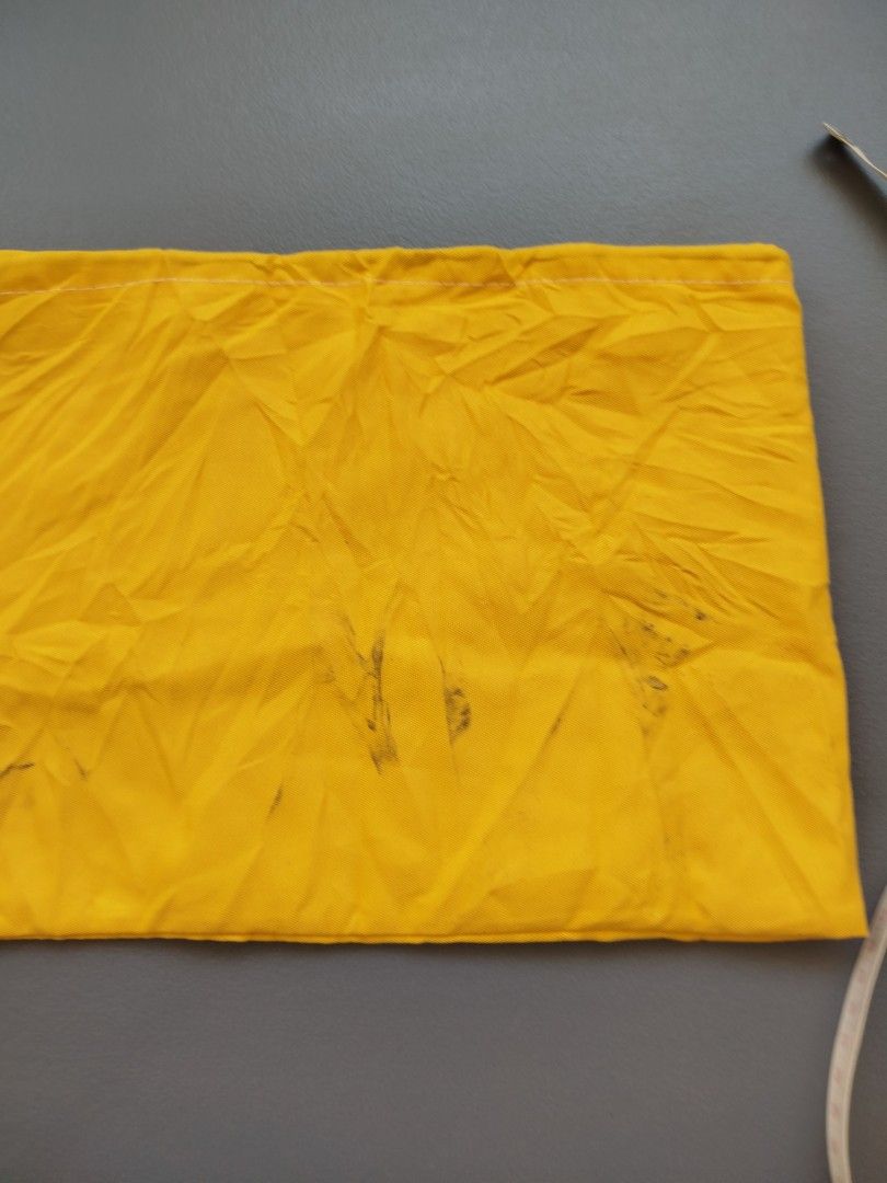 Goyard Dust Bag (Category: Luxury Bags & Wallets) located in Calamba. Submitted by merrymerida (Listing ID 1438914466, Image 3). Description: - Authentic Goyard dust bag - Color: Yellow - Shape: Rectangular - Features the Goyard logo - Condition: Shows some stains - Dimensions: Approximately 14 inches (height) x 9 inches (width).