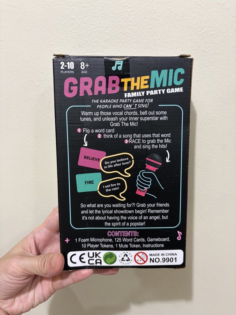 Grab The Mic Karaoke Party Game (Category: Microphones) located in Las Pinas. Submitted by bellagirl28 (Listing ID 1438920890, Image 2). Description: - Grab The Mic: The hilarious karaoke game! - Designed for people who can't sing! - Includes: Foam microphone, 125 word cards, 10 player tokens, and a mute token. - For 2-10 players. - Ages 8 and up. - Perfect for family parties and game nights! - Race your friends and family to sing the lyrics!.