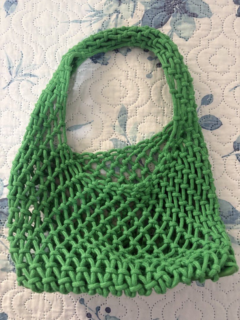 Green Bag (Category: Shoulder Bags) located in Antipolo. Submitted by theeditedcloset (Listing ID 1438924606, Image 2). Description: - Green macrame shoulder bag - Woven design - Vibrant green color - Perfect for carrying essentials - Stylish and practical accessory.