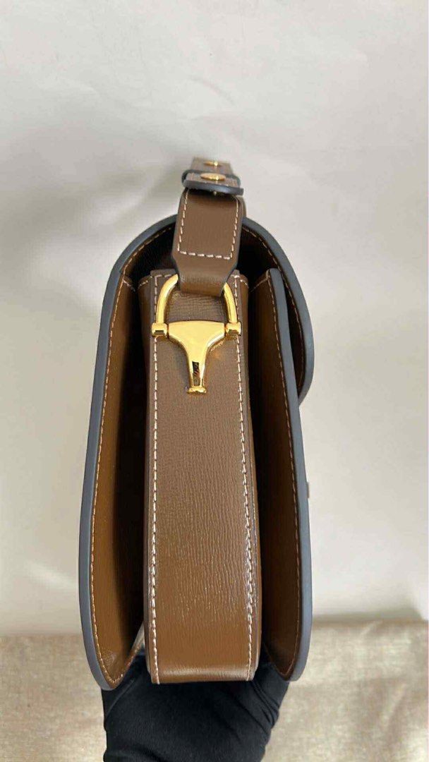 Gucci Horsebit 1955 Adjustable Bag (Category: Luxury Bags & Wallets) located in Hermosa. Submitted by bookwormhermosa (Listing ID 1438893952, Image 3). Description: - Gucci Horsebit 1955 Shoulder Bag - Brown leather exterior - Iconic gold-toned Horsebit detail - Flap closure - Detachable shoulder strap - Light-colored fabric lining - Includes dust bag with Gucci logo.