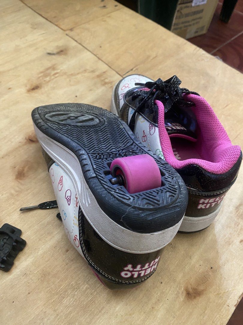 Hello Kitty Heelys Roller Shoes (Last Price!!) (Category: Babies & Kids Fashion) located in Las Pinas. Submitted by myretail4sale (Listing ID 1438953630, Image 3). Description: Kitty Heelys roller shoes. Includes the original wheels and the covers. Size is US 2, UK 1, EUR 33, and CM 20. The shoes have a white base with Kitty graphics and pink accents. The soles have visible wear but just because it was stocked for awhile. Will clean it before shi