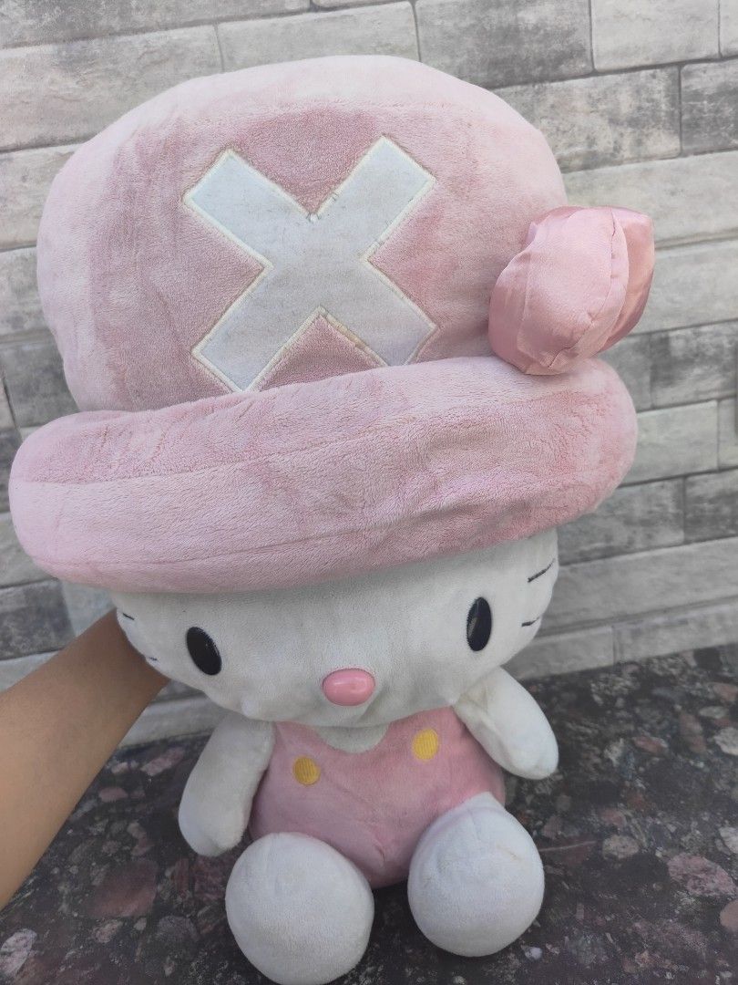Hello Kitty X One Piece stuffed toy/plush (Category: Toys & Games) located in Iloilo. Submitted by janhils (Listing ID 1438938783, Image 2). Description: For 200 only It's big, may minor stains, and ang tag faded na Needs Washing, stuffing needs fixing pumunta halos lahat sa hat niya haha Please manage your expectations Can send more pics via PM Located in Iloilo City FEEL FREE TO LEGIT CHECK🫶🏽 Shipping is during weekdays via J&T or preferred c