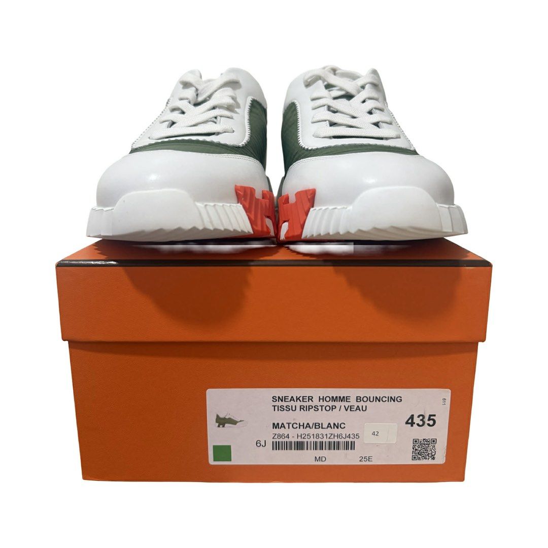 Hermes Bouncing Sneakers Matcha/Blanc (Category: Sneakers) located in Mandaluyong City. Submitted by mclldmrl (Listing ID 1439017799, Image 1). Description: - Authentic Hermes Bouncing sneakers - Colorway: Matcha/Blanc - Size: 42 - Condition: Unworn - Includes original box - Unique design with white sole and green/white upper - Distinctive Hermes logo on sole.