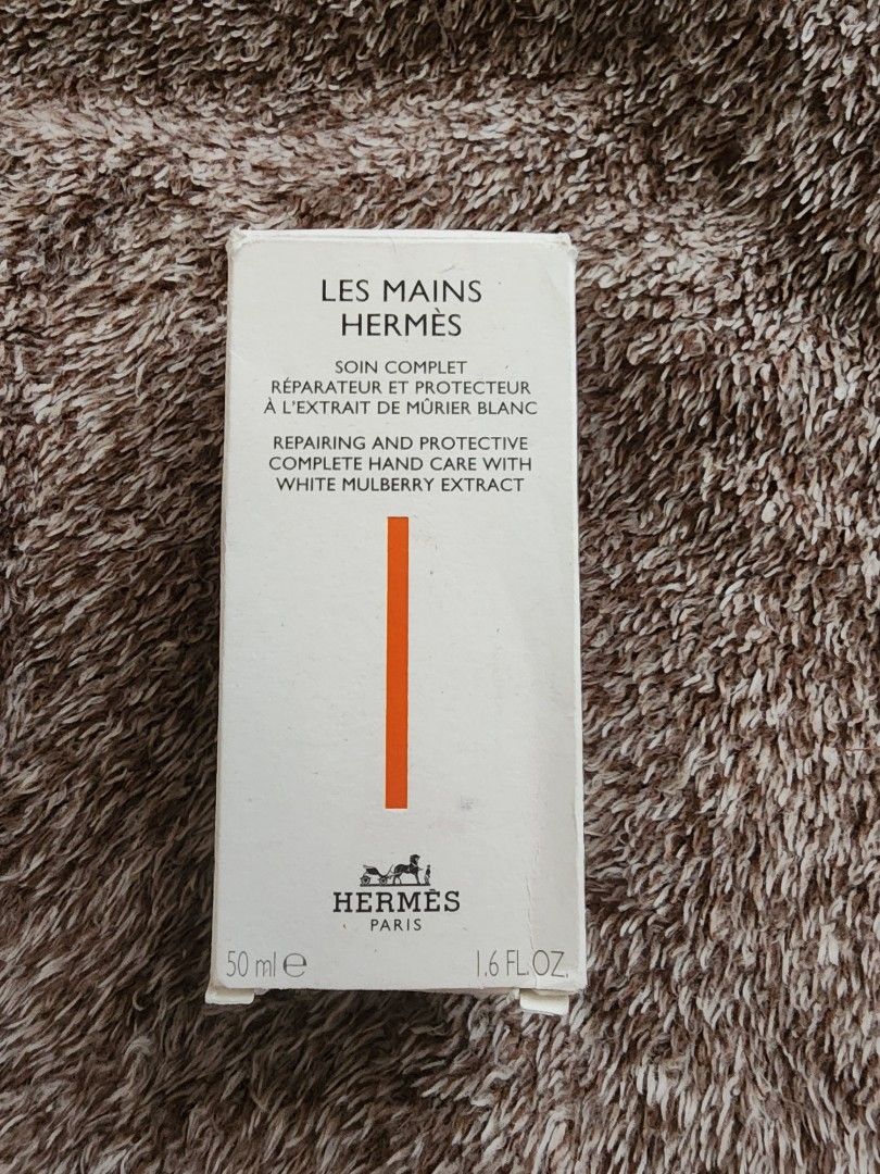 Hermès Les Mains Hand Cream (Category: Hands & Nails) located in Cebu City. Submitted by luxcebuph (Listing ID 1438940704, Image 1). Description: - Hermès Les Mains hand cream - 50ml / 1.6 fl oz - Complete hand care for hands and nails - Hydrating and nourishing - Repairs and protects - Contains white mulberry extract - Smoothing and unifying properties.