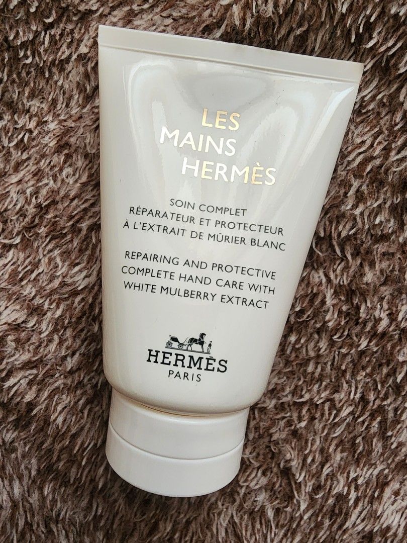 Hermès Les Mains Hand Cream (Category: Hands & Nails) located in Cebu City. Submitted by luxcebuph (Listing ID 1438940704, Image 3). Description: - Hermès Les Mains hand cream - 50ml / 1.6 fl oz - Complete hand care for hands and nails - Hydrating and nourishing - Repairs and protects - Contains white mulberry extract - Smoothing and unifying properties.