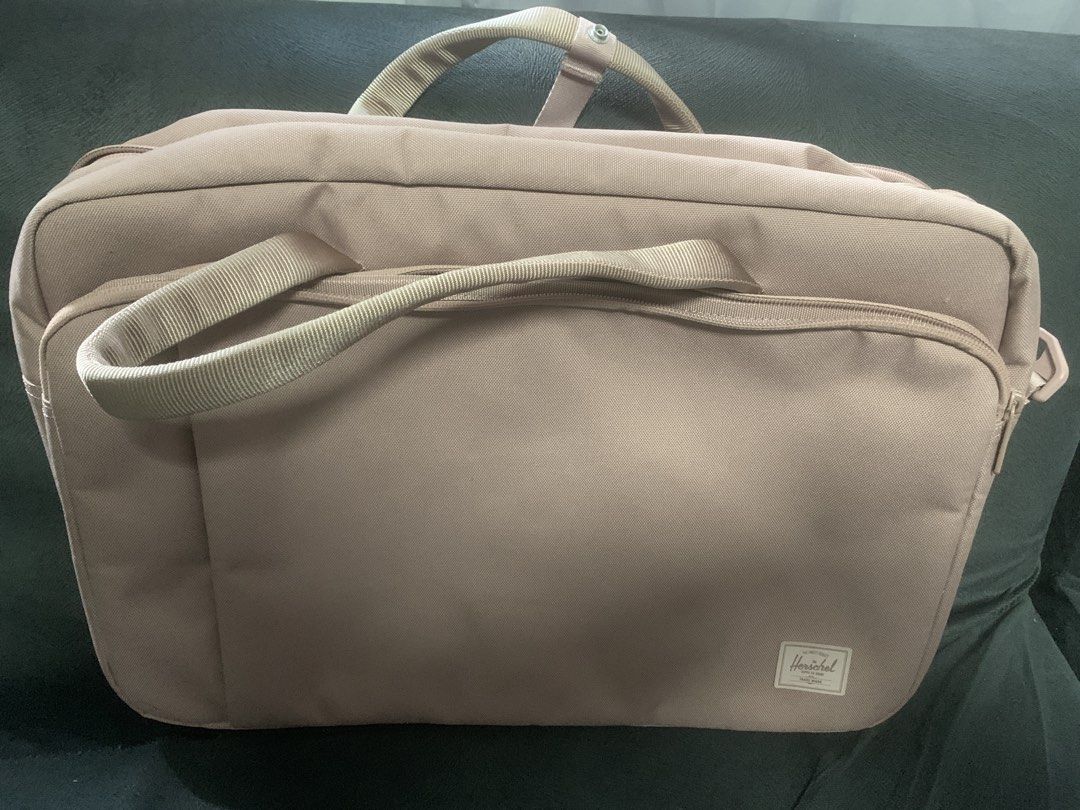Herschel Bowen Duffle Tech - Ash Rose Tonal (Category: Cross-body Bags) located in Manila. Submitted by everythingisbranded_ (Listing ID 1438952754, Image 1). Description: - Herschel Bowen Duffle Tech - Color: Ash Rose Tonal - Condition: New and unused - Features: - Main compartment - Multiple internal pockets - Zippered front pocket - Includes: - Top handle - Shoulder strap - Herschel zipper pull.